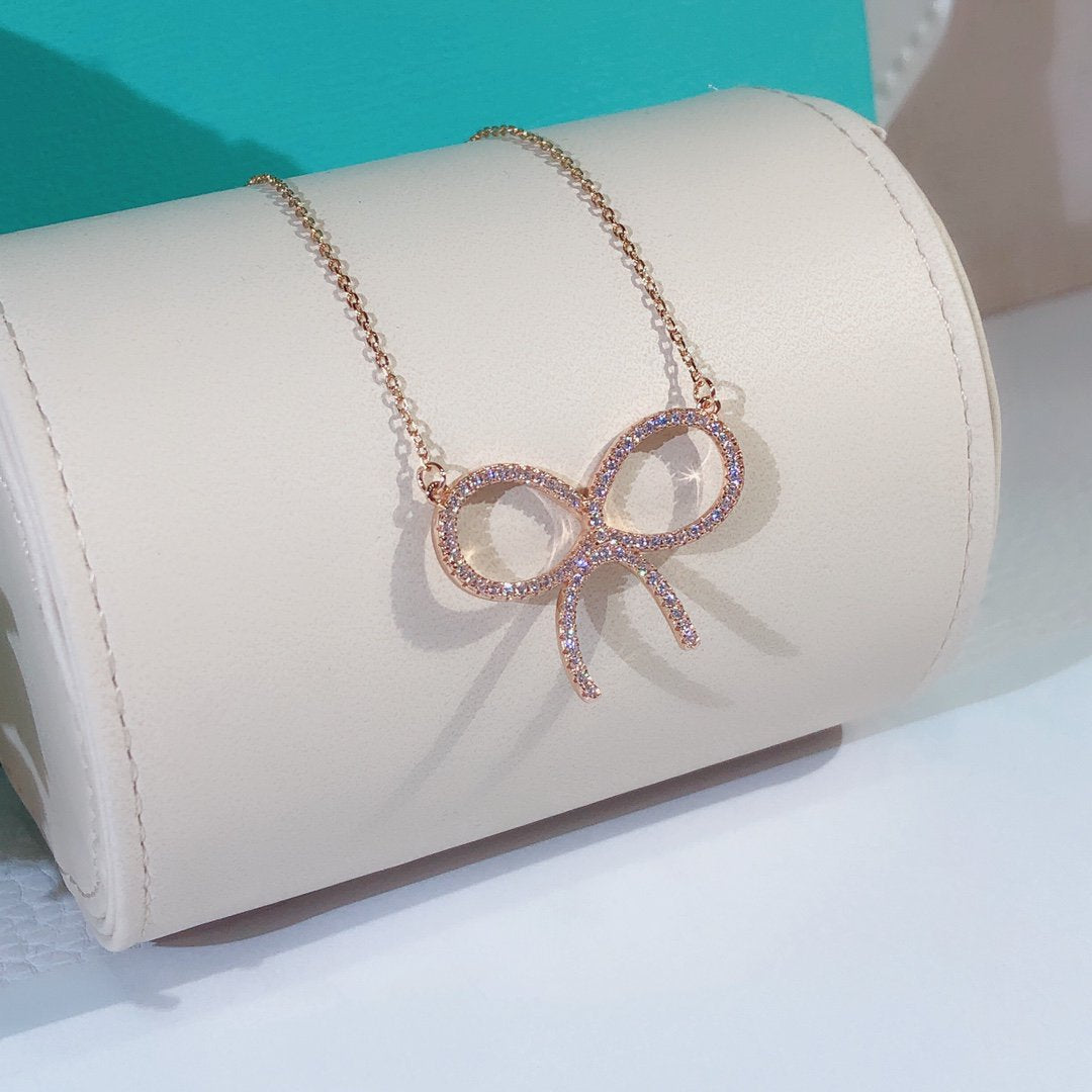 [Haelin Jewelry]CLAW SET RHODIUM PLATED BOW NECKLACE