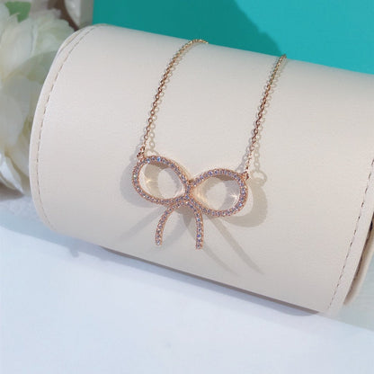 [Haelin Jewelry]CLAW SET RHODIUM PLATED BOW NECKLACE