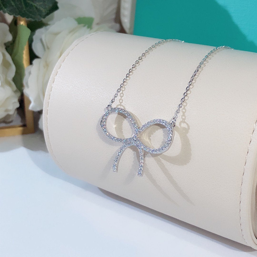 [Haelin Jewelry]CLAW SET RHODIUM PLATED BOW NECKLACE